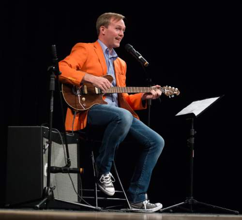Steve Griffin / The Salt Lake Tribune

Salt Lake County Mayor Ben McAdams performs and original song as he joined Mike Winder and Aimee Winder Newton during the Winder-Ful Variety Show at the Utah Cultural Celebration Center in West Valley City Tuesday August 30, 2016.