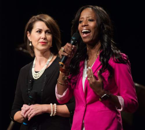 Steve Griffin / The Salt Lake Tribune

Senator Deidre Henderson and Congresswoman Mia Love sing a song from the Broadway hit musical "Hamilton" as they joined Mike Winder and Aimee Winder Newton during the Winder-Ful Variety Show at the Utah Cultural Celebration Center in West Valley City Tuesday August 30, 2016.