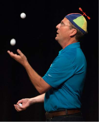 Steve Griffin / The Salt Lake Tribune

State Board of Education member Stan Lockhart juggles golf balls as he and Spencer Stokes joined Mike Winder and Aimee Winder Newton during the Winder-Ful Variety Show at the Utah Cultural Celebration Center in West Valley City Tuesday August 30, 2016.