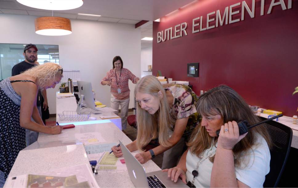 Al Hartmann  |  The Salt Lake Tribune
Office secretaries deal with dozens of last minute details at the brand new Butler Elementary in Cotonwood Heights Wenesday March 25.  It is one of hundreds of schools that opened Wednesday as students gear up for the 2016-2017 school year.