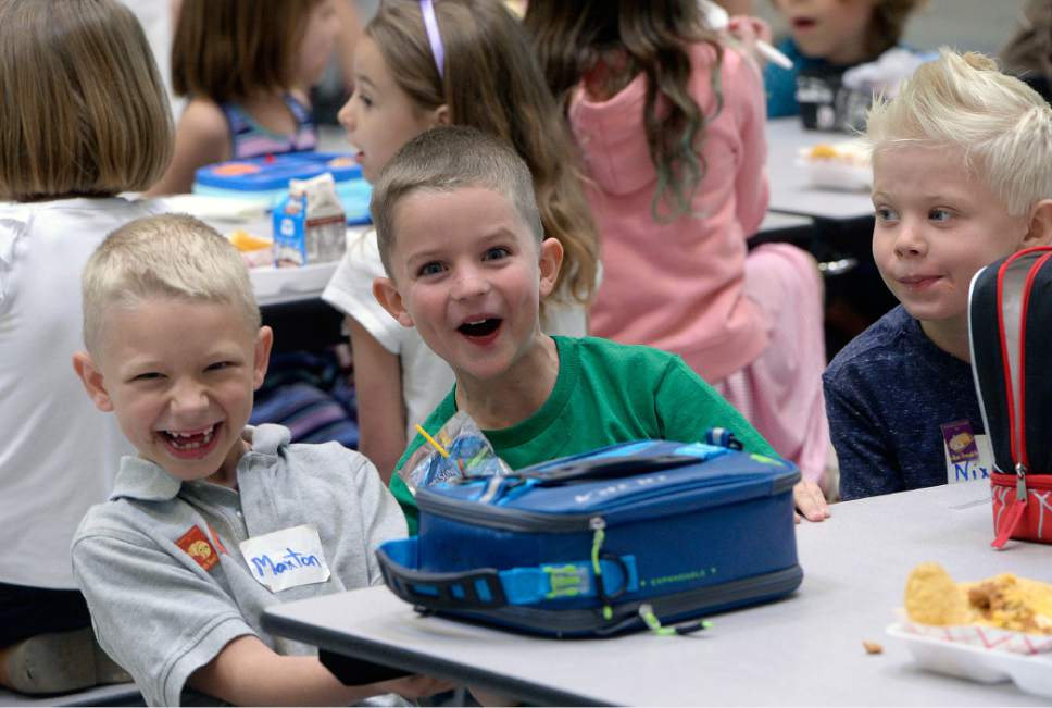 Al Hartmann  |  The Salt Lake Tribune
Students have too much fun during first lunch in the cafeteria at the brand new Butler Elementary in Cotonwood Heights Wenesday March 25.  It is one of hundreds of schools that opened Wednesday as students gear up for the 2016-2017 school year.