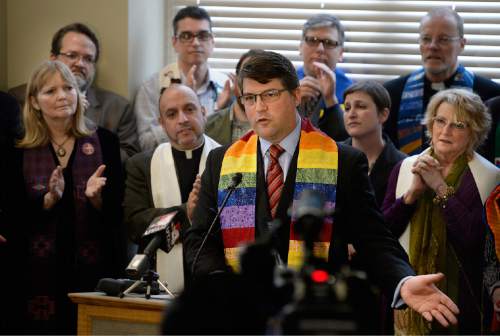 Scott Sommerdorf   |  The Salt Lake Tribune
Pastor Curtis Price from Salt Lake's First Baptist Church speaks at a press conference about the need to pass SB 100 - Antidiscrimination Amendments, Thursday, February 12, 2015. Behind Price is a group of leaders from diverse faiths who came in support and who also spoke.