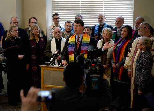 Scott Sommerdorf   |  The Salt Lake Tribune
Pastor Curtis Price from Salt Lake's First Baptist Church speaks at a press conference about the need to pass SB 100 - Antidiscrimination Amendments, Thursday, February 12, 2015. Behind Price is a group of leaders from diverse faiths who came in support and who also spoke.