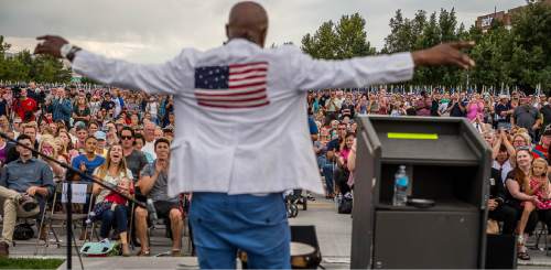 Trent Nelson  |  The Salt Lake Tribune
Alex Boyé sings at a September 11th ceremony at the Healing Field in Sandy, Sunday September 11, 2016.