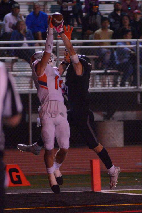 Leah Hogsten  |  The Salt Lake Tribune
Alta's London Rockwood keeps Timpview's Niles Herrod from pulling down the catch in the end zone. Fifth-ranked Alta High School defeated third-ranked Timpview High School during their Region 7 game, September 9, 2016.