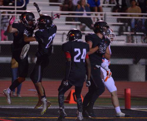 Leah Hogsten  |  The Salt Lake Tribune
Alta's London Rockwood celebrates after stopping Timpview from scoring. Fifth-ranked Alta High School defeated third-ranked Timpview High School during their Region 7 game, September 9, 2016.