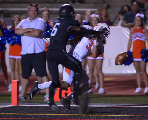 Leah Hogsten  |  The Salt Lake Tribune
Alta's Tyler Hill knocks down the pass intended for Timpview's Chaz Ah you on Timpview's last down of the game. Fifth-ranked Alta High School defeated third-ranked Timpview High School during their Region 7 game, September 9, 2016.