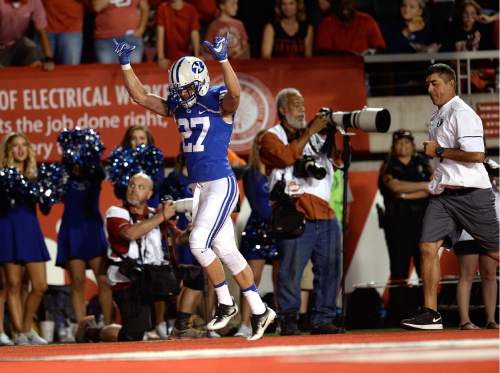 Scott Sommerdorf   |  The Salt Lake Tribune  
BYU DB Austin McCheseny reacts to fans taunting him as he leaves the field after having been ejected for targeting. Utah defeated BYU 20-19, Saturday, September 10, 2016.