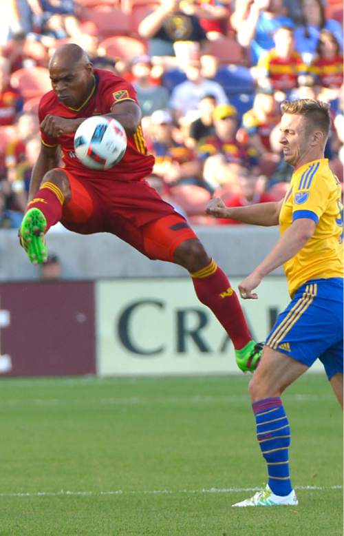 Leah Hogsten  |  The Salt Lake Tribune
Real Salt Lake defender Jamison Olave (4) battles Colorado Rapids forward Kevin Doyle (9). Real Salt Lake is tied 1-1with the Colorado Rapids during their Rocky Mountain Championship Cup game at Rio Tinto Stadium Friday, August 26, 2016.