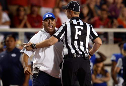 Scott Sommerdorf   |  The Salt Lake Tribune  
BYU head coach Kalani Sitake argues that his DB Kai Nacua should not have been ejected for targeting. Utah defeated BYU 20-19, Saturday, September 10, 2016.