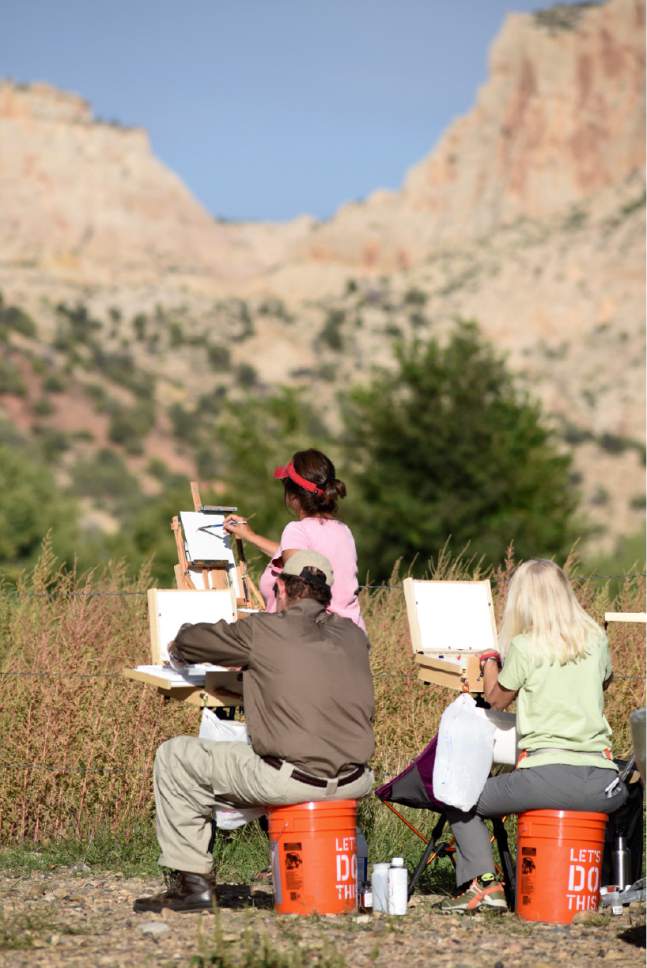Lynn Johnson  | Special to The Salt Lake Tribune

Escalante's scenic canyons provide ample subject matter for these beginning art students from the Millcreek area of Salt Lake City during last year's  Escalante Canyons Art Festival.