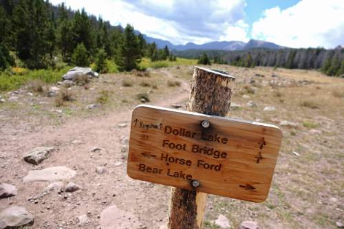 Lennie Mahler  |  The Salt Lake Tribune

The trail sign at Elkhorn Crossing, about 5.5 miles along Henrys Fork Trail toward Kings Peak in the Uinta Mountains. Monday, Sept. 5, 2016.