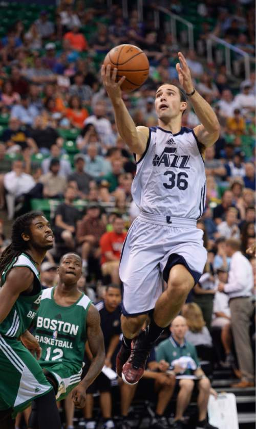 Steve Griffin / The Salt Lake Tribune

Utah Jazz guard Aaron Craft slices his way to the basket during the Jazz versus Celtics summer league game at the Vivint Smart Home Arena in Salt Lake City Tuesday July 5, 2016.