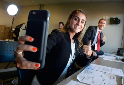 Scott Sommerdorf   |  The Salt Lake Tribune  
Carla Swensen Haslam makes a quick photo of herself and fellow announcer Landon Southwick to post on social media prior to the Monarchs match versus the Orange County Blues, Friday, September 9, 2016. Carla Swensen Haslam, a junior forward on the nationally-ranked BYU women's soccer team, also serves as the color commentator on the broadcast for Real Monarchs matches.