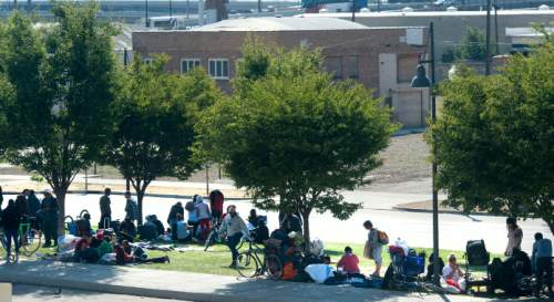 Steve Griffin / The Salt Lake Tribune


People hang out on the grass that runs down 500 west behind the Rio Grande Building in Salt Lake City Thursday September 15, 2016.  The Downtown Alliance has had it with the worsening homeless situation in and around the Rio Grande area.