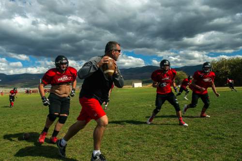 Chris Detrick  |  The Salt Lake Tribune
North Sanpete High School football defensive coordinator Dave Peck works with the team during a practice in Mt. Pleasant Wednesday September 14, 2016.