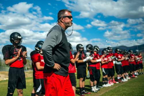 Chris Detrick  |  The Salt Lake Tribune
North Sanpete High School football defensive coordinator Dave Peck works with the team during a practice in Mt. Pleasant Wednesday September 14, 2016.