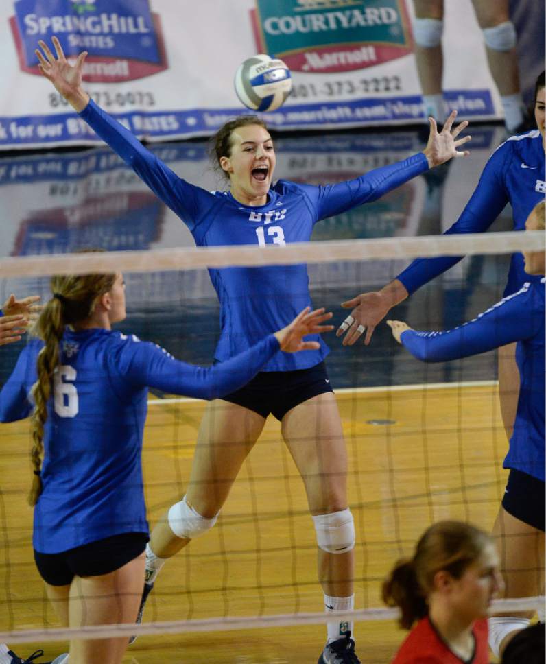 Francisco Kjolseth | The Salt Lake Tribune
BYU's Danelle Parady-Stetler throws her arms out in celebration over a point over Utah in women's volleyball at the Smith Fieldhouse in Provo on Thursday, Sept. 15, 2016.