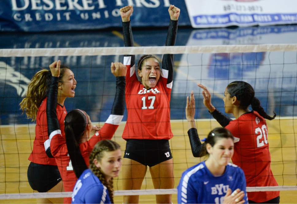 Francisco Kjolseth | The Salt Lake Tribune
Utah's Tristyn Moser throws her arms up the air as she celebrates a point with her teammates against BYU in women's volleyball at the Smith Fieldhouse in Provo on Thursday, Sept. 15, 2016.