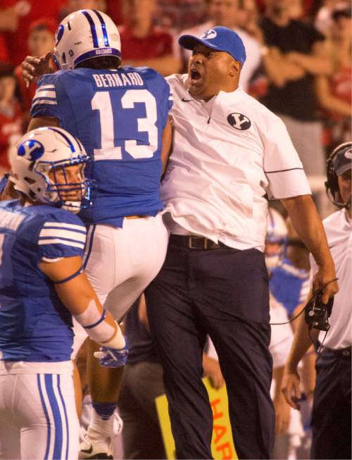 Rick Egan  |  The Salt Lake Tribune

Brigham Young Cougars head coach Kalani Sitake celebrates Brigham Young Cougars linebacker Francis Bernards interception, in football action, BYU vs. Utah, at Rice-Eccles Stadium, Saturday, September 10, 2016.