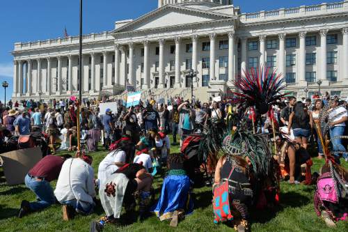 Chris Detrick  |  The Salt Lake Tribune
People participate in the Utah Stands with Standing Rock rally and march at the Utah State Capitol Saturday September 17, 2016.