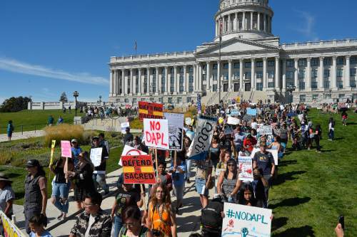 Chris Detrick  |  The Salt Lake Tribune
People participate in the Utah Stands with Standing Rock rally and march at the Utah State Capitol Saturday September 17, 2016.