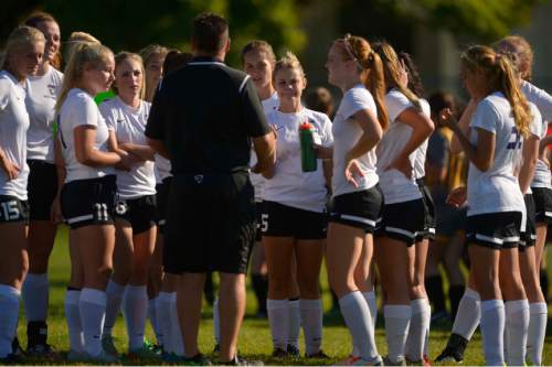 Leah Hogsten  |  The Salt Lake Tribune
Tooele's coach Stephen Duggan gives guidance after their win against Union High School, 6-0, September 16, 2016. Tooele High School girls' soccer team has never won a state title, in fact the Buffaloes have rarely even had a winning season. That's what has made this season so special. Under the direction of  Duggan, Tooele is off to a 7-1-2 start, and feeling very much like a title contender for once.