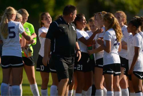 Leah Hogsten  |  The Salt Lake Tribune
Tooele's coach Stephen Duggan and the team after their win against Union High School, 6-0, September 16, 2016. Tooele High School girls' soccer team has never won a state title, in fact the Buffaloes have rarely even had a winning season. That's what has made this season so special. Under the direction of Duggan, Tooele is off to a 7-1-2 start, and feeling very much like a title contender for once.