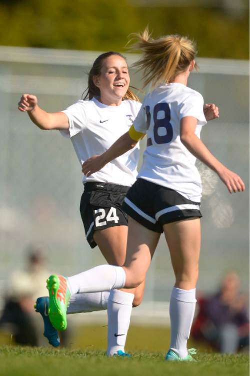 Leah Hogsten  |  The Salt Lake Tribune
Tooele's Carrie Cooper celebrates teammate BobbiJo Meyer's goal during their win against Union High School, 6-0, September 16, 2016. Tooele High School girls' soccer team has never won a state title, in fact the Buffaloes have rarely even had a winning season. That's what has made this season so special. Under the direction of head coach Stephen Duggan, Tooele is off to a 7-1-2 start, and feeling very much like a title contender for once.