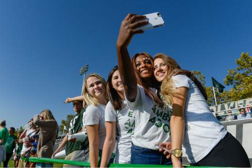 Francisco Kjolseth | The Salt Lake Tribune
UVU students Elle Walker, Maddie Parker, Natalie Jones and Vanessa South, from left, take a selfie as they wait for the men's soccer team to take on Gonzaga in Orem recently. The program is in its third year of existence, but is already establishing itself among the nation's best. The Wolverines are already nationally-ranked by several polls and are a hit on campus, playing to several sold-out crowds at Clyde Field in its first few years.