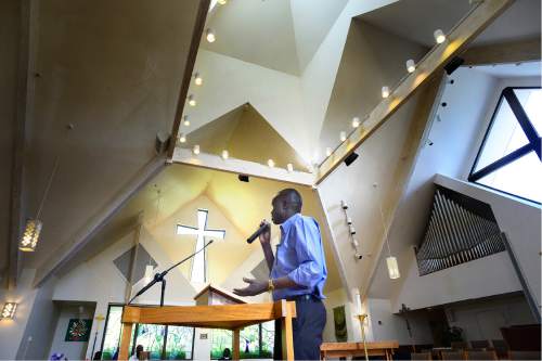 Scott Sommerdorf   |  The Salt Lake Tribune  
John Ngong speaks about his friend, Phillip Aguto, during the memorial service for him, Sunday, August 28, 2016 at All Saints Episcopal Church. Aguto was killed in a hit-and-run accident. in mid-August. He was part of the 20,000 Lost Boys of Sudan, and came to the U.S. in 2001, later becoming a citizen.