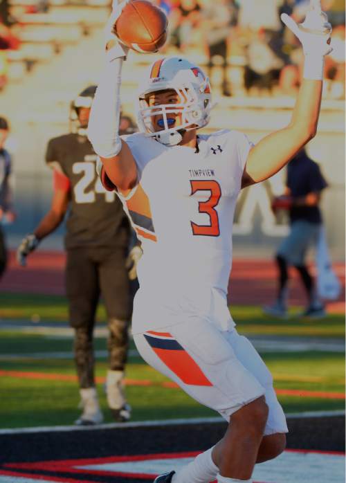 Leah Hogsten  |  The Salt Lake Tribune
Timpview's Chaz Ah You scores a touchdown in the first half. Third-ranked Timpview High School leads fifth-ranked Alta High School 24-6 at the half during their Region 7 game, September 9, 2016.