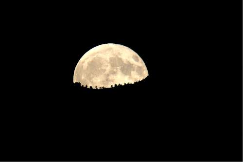 Scott Sommerdorf   |  The Salt Lake Tribune  
The Harvest Moon rises over the ridge as seen from Syracuse. Syracuse beat Viewmont 13-6, Friday, September 16, 2016.