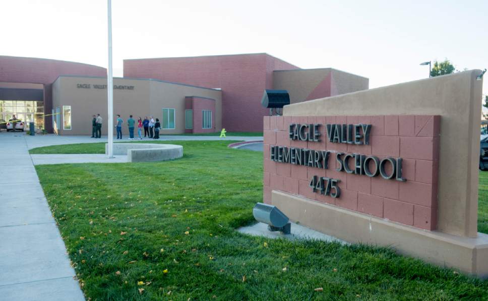 Rick Egan  |  The Salt Lake Tribune

Eagle Valley Elementary in Eagle Mountain was evacuated after a masked man entered the school on Monday, Sept. 19, 2016.