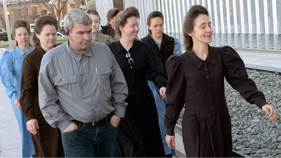 Al Hartmann  |  The Salt Lake Tribune 
FLDS men and women march together to Lyle Jeffs' detention status hearing Wednesday April 6 at the Federal Courthouse in Salt Lake City.  Pauline Barlow, senior wife of Lyle Jeffs, at right.