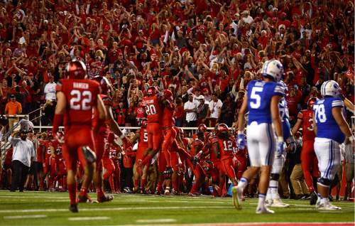 Scott Sommerdorf   |  The Salt Lake Tribune  
Utah players celebrate and the crowd goes nuts after BYU QB Taysom Hill is stopped short of the goal line, ending the game. Utah defeated BYU 20-19, Saturday, September 10, 2016.