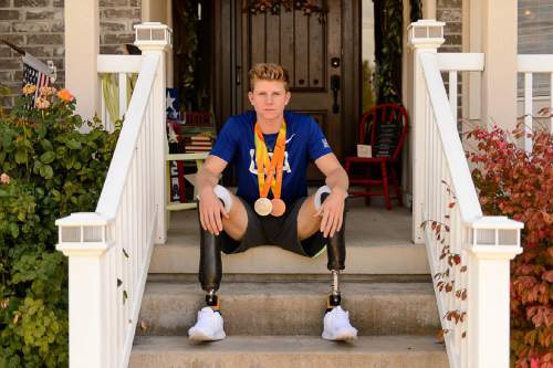 Trent Nelson  |  The Salt Lake Tribune
17-year-old Hunter Woodhall with the two Paralympic medals he won in track & field in Rio. Thursday September 22, 2016.