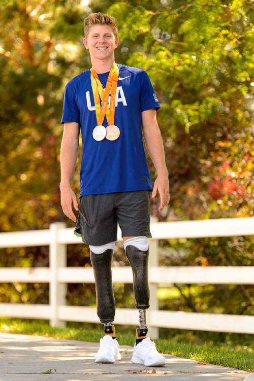 Trent Nelson  |  The Salt Lake Tribune
17-year-old Hunter Woodhall with the two Paralympic medals he won in track & field in Rio. Thursday September 22, 2016.