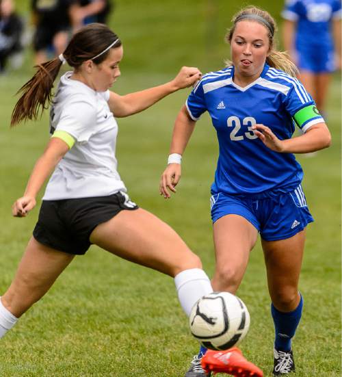 Trent Nelson  |  The Salt Lake Tribune
Fremont's Ellee Iverson (23) and Weber's Mylee Broad as Weber hosts Fremont high school soccer in Ogden, Thursday September 22, 2016.