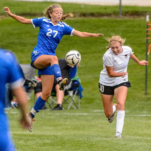 Trent Nelson  |  The Salt Lake Tribune
Fremont's Rylee Hunsaker, left, and Weber's Hannah Hillstrom as Weber hosts Fremont high school soccer in Ogden, Thursday September 22, 2016.