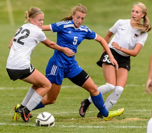 Trent Nelson  |  The Salt Lake Tribune
Fremont's Grace Youngberg goes between Weber's Brinlee Collings and Adree Johnson as Weber hosts Fremont high school soccer in Ogden, Thursday September 22, 2016.