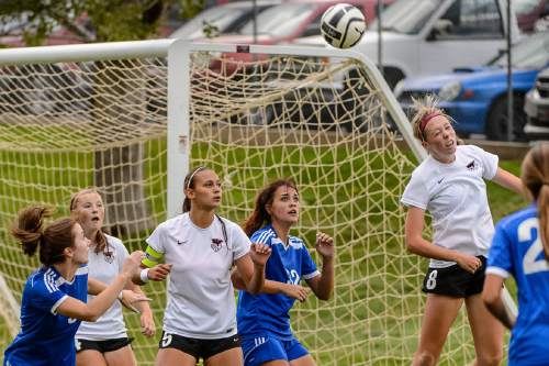 Trent Nelson  |  The Salt Lake Tribune
Weber's Sidney Roberts heads the ball as Weber hosts Fremont high school soccer in Ogden, Thursday September 22, 2016.