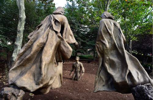 Scott Sommerdorf   |  The Salt Lake Tribune  
The sculpture "This Is My Beloved Son Joseph Smith" -  History 1:17, Thursday, September 22, 2016 in the The Light of the World garden. The garden has sculptures created by Utah artist Angela Johnson, including a total of 15 scenes and 35 statues, with 14 scenes from the New Testament and one, LDS Church-inspired scene depicting Joseph Smith's First Vision.