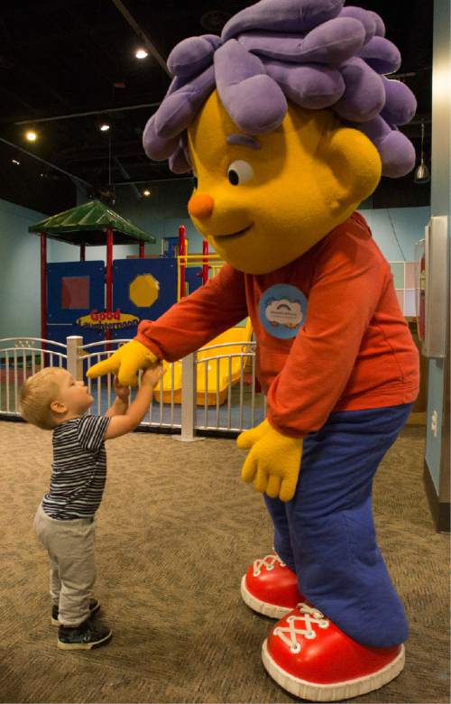 Rick Egan  |  The Salt Lake Tribune

Collin Maloney, 1, Bountiful, meets Sid the Science Kid at the Discovery Gateway's newest traveling exhibit which brings the award-winning PBS Kids TV series Sid the Science Kid to life. Friday, September 23, 2016. The public opening is Saturday at 11:00 am.