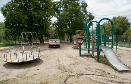 Rick Egan  |  The Salt Lake Tribune

There is a plan to renovate the Lindsey Gardens playground and get rid of the classic metal merry-go-round. Residents are angry & are organizing to save it. Wednesday, September 14, 2016.