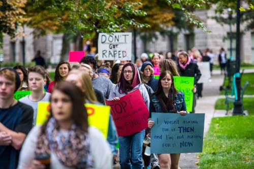 Chris Detrick  |  The Salt Lake Tribune
Participants walk North on State Street to the state Capitol during the 5th annual SlutWalk Walk of No Shame Saturday September 24, 2016. The annual SlutWalk is a march against sexual assault, victim blaming, slut shaming, and rape culture- with millions of participants in thousands of cities around the globe. The Walk of No Shame aims to strike down the ideas that survivors of sexual assault or violence somehow deserved it, or that anyone is inviting this behavior. By dismantling this idea, and the culture that surrounds it, we hope to see better access to help for survivors, better reporting methods, and less stigma around reporting these crimes.