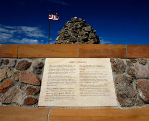 The American Flag flies over the Mountain Meadows Massacre Grave Site Memorial near Enterprise, UT Sept. 7, 2007.  Steve Griffin/The Salt Lake Tribune 9/10/07