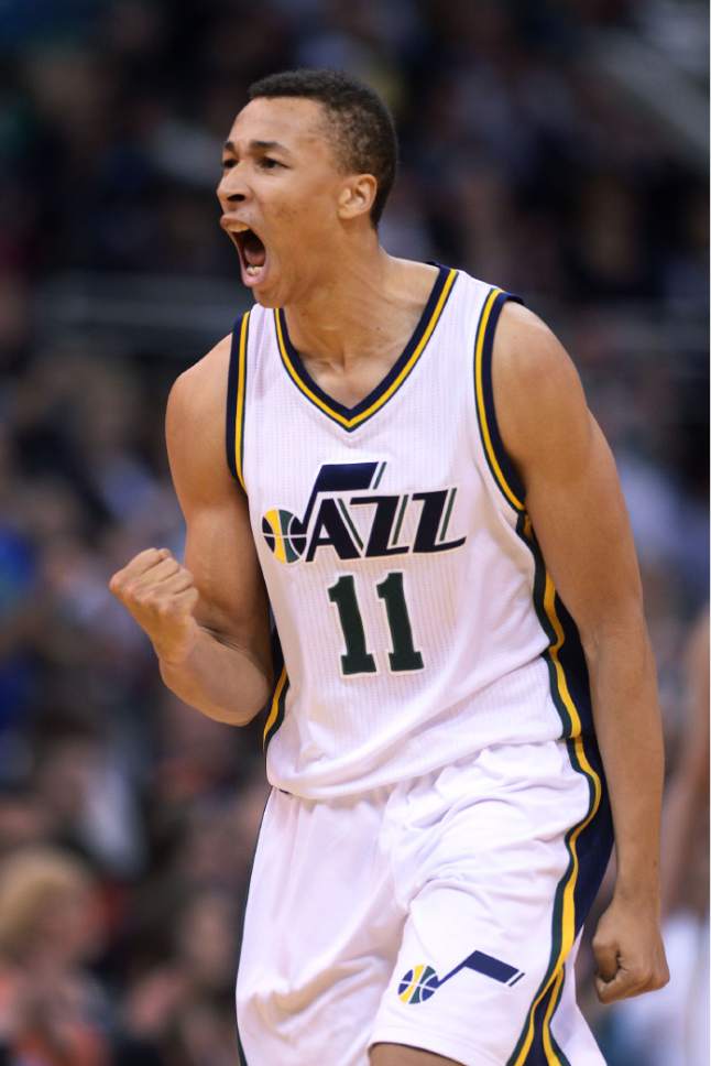 Steve Griffin  |  The Salt Lake Tribune

Utah Jazz guard Dante Exum (11) pumps his fist and screams with excitement after he could Utah Jazz forward Joe Ingles (2) in the corner for three-pointer during second half action in the Utah Jazz versus New York Knicks NBA basketball game at EnergySolutions Arena in Salt Lake City, Tuesday, March 10, 2015.