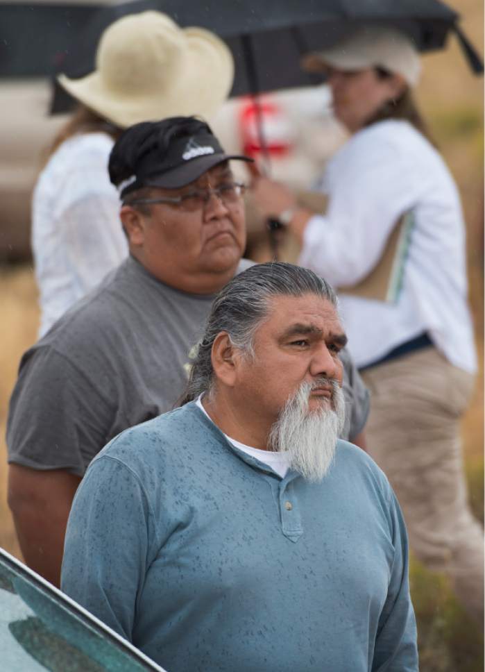 Leah Hogsten  |  The Salt Lake Tribune
 Kaibab Band of Paiute Indians tribal chairman Roland Maldonado, front, and Daniel Bulletts, tribal environmental director listen as a representative with MWH Global's engineering firm details the proposed route for the proposed Lake Powell Pipeline (LPP). The LPP will cut through the Kaibab Band of Paiute's reservation in one of two proposed routes and Maldonado said the tribe favors limiting damage to undisturbed sacred sites. Officials from the Federal Energy Regulatory Commission (FERC) began a two-day site visit in southern Utah Tuesday, examining the 139-mile route of the proposed Lake Powell Pipeline, September 20, 2016. The public tour was so that FERC could view the pipeline's planned hydropower stations, proposed alignment and the environment the pipeline will cross.