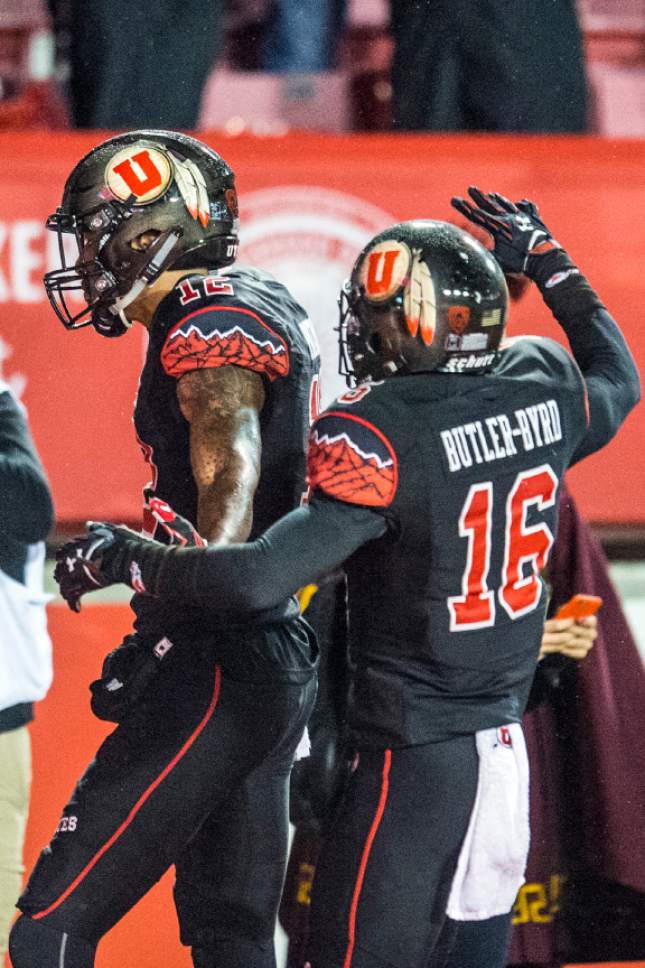 Chris Detrick  |  The Salt Lake Tribune
Utah Utes wide receiver Tim Patrick (12) and Utah Utes wide receiver Cory Butler-Byrd (16) celebrate after Patrick scored the game-winning touchdown during the game at Rice-Eccles Stadium Friday September 23, 2016. Utah Utes defeated USC Trojans 31-27.